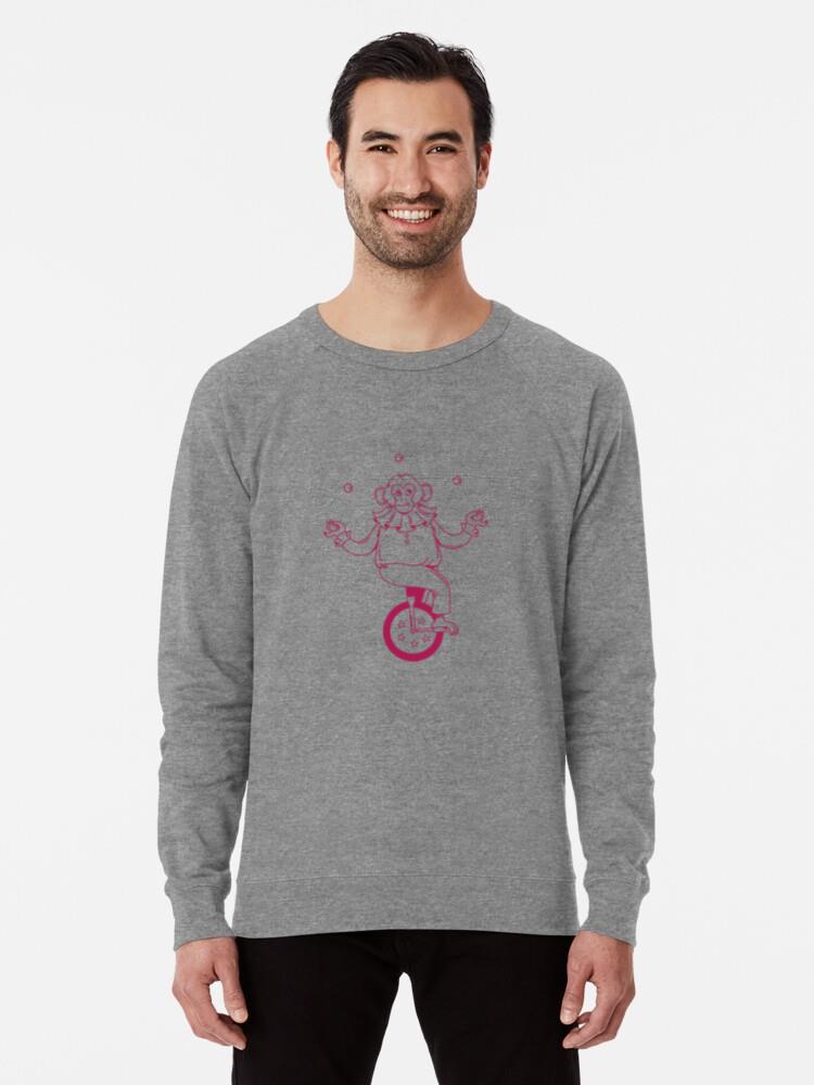 A Mischievous Monkey Juggler Balancing On A Single Wheel Bicycle Sweatshirt - Image 2
