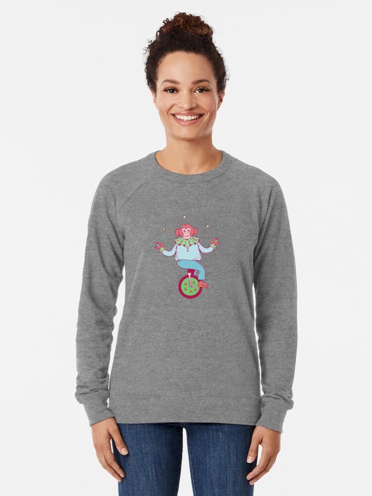 A Mischievous Monkey Juggler Riding A Unicycle Sweatshirt - Image 3