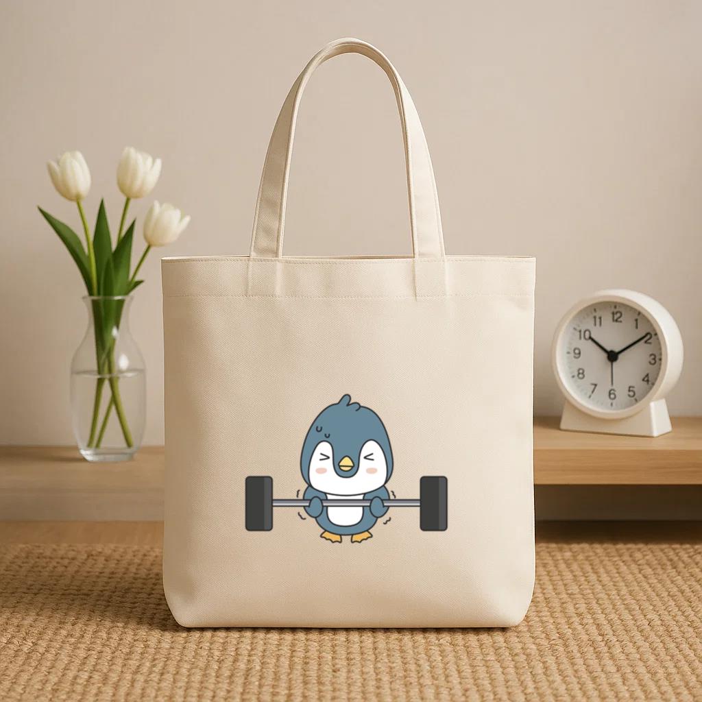Cartoon Penguin Lifting A Barbell Canvas Tote Bag - Image 2